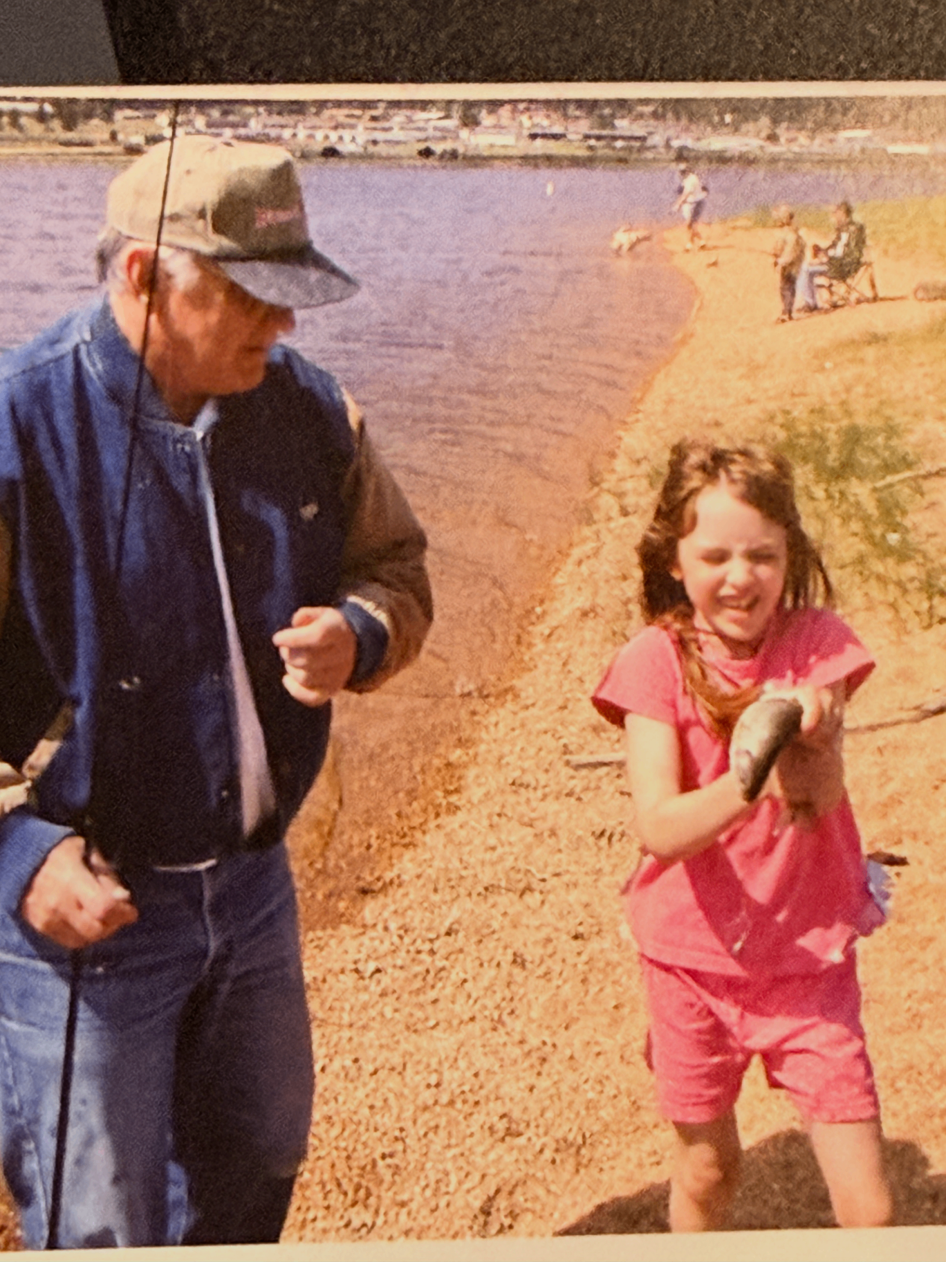 Grandpa fishing with Natalie