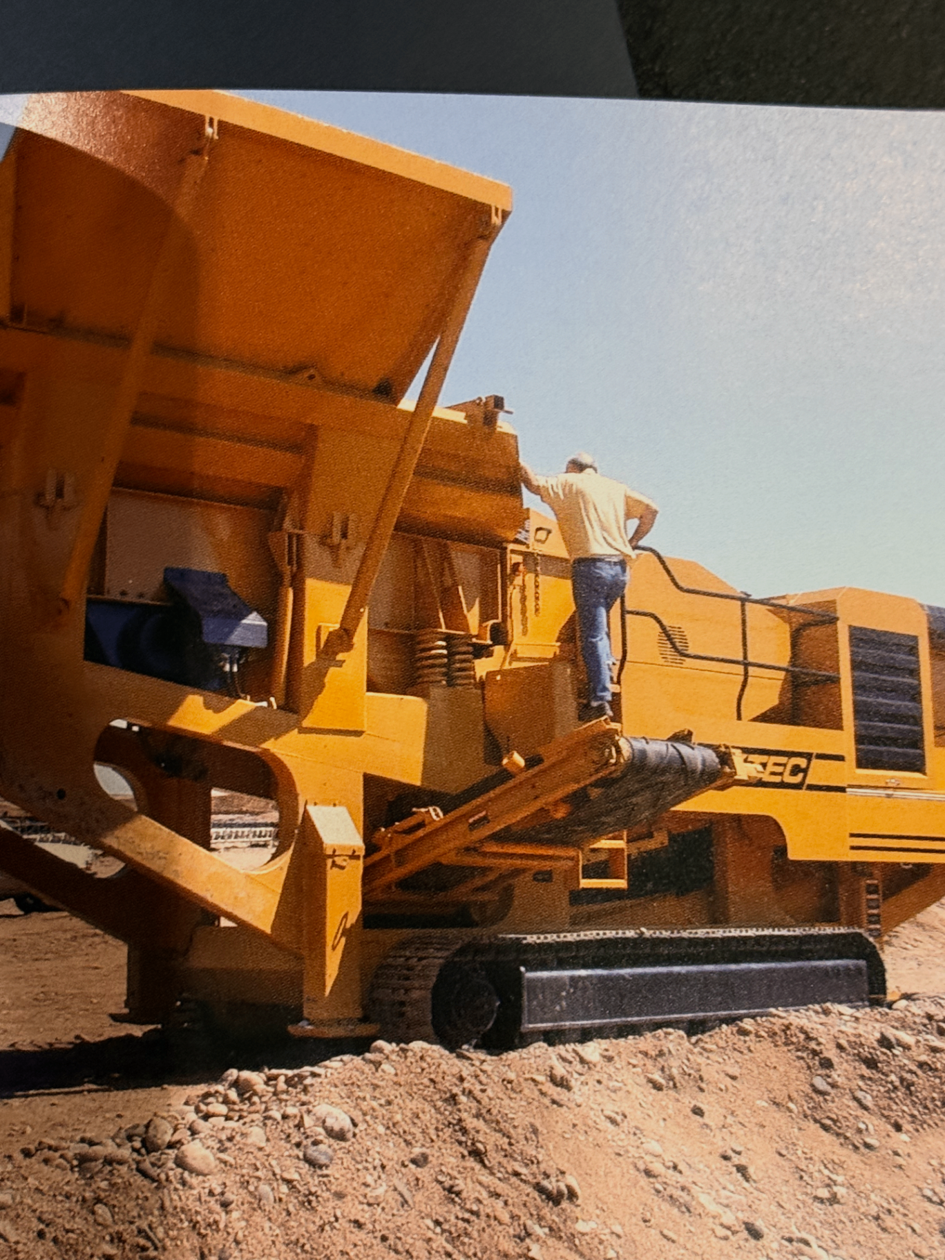Daddy crawling on a rock crusher