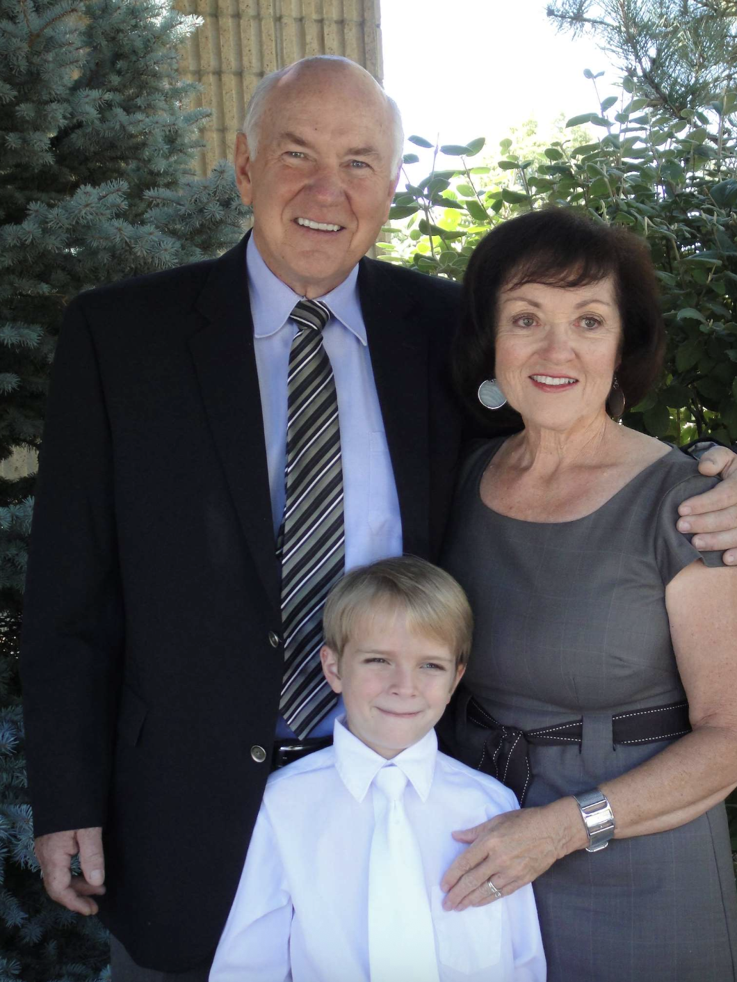 Mom and Dad with Matt at his baptism