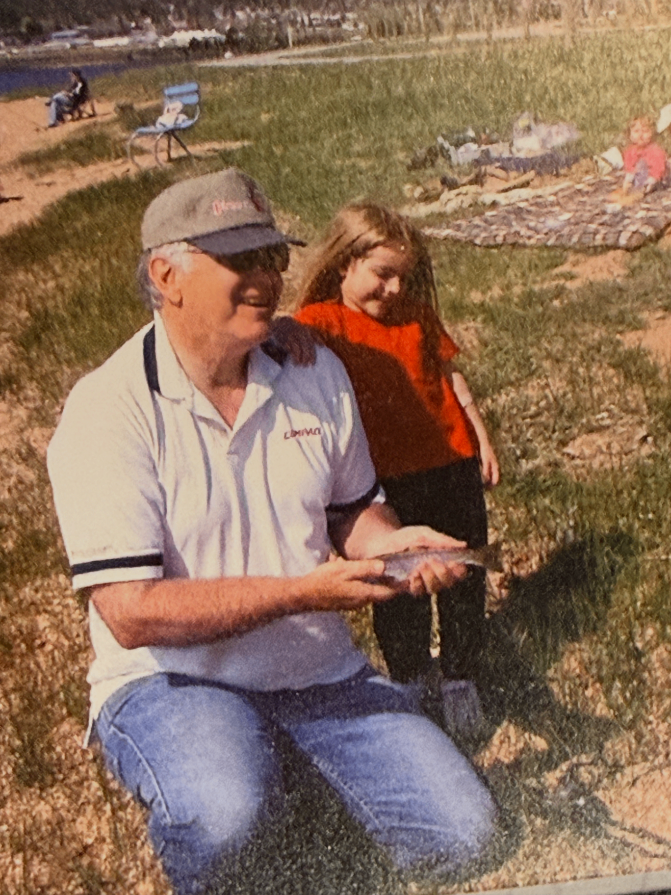 Evie fishing with Grandpa