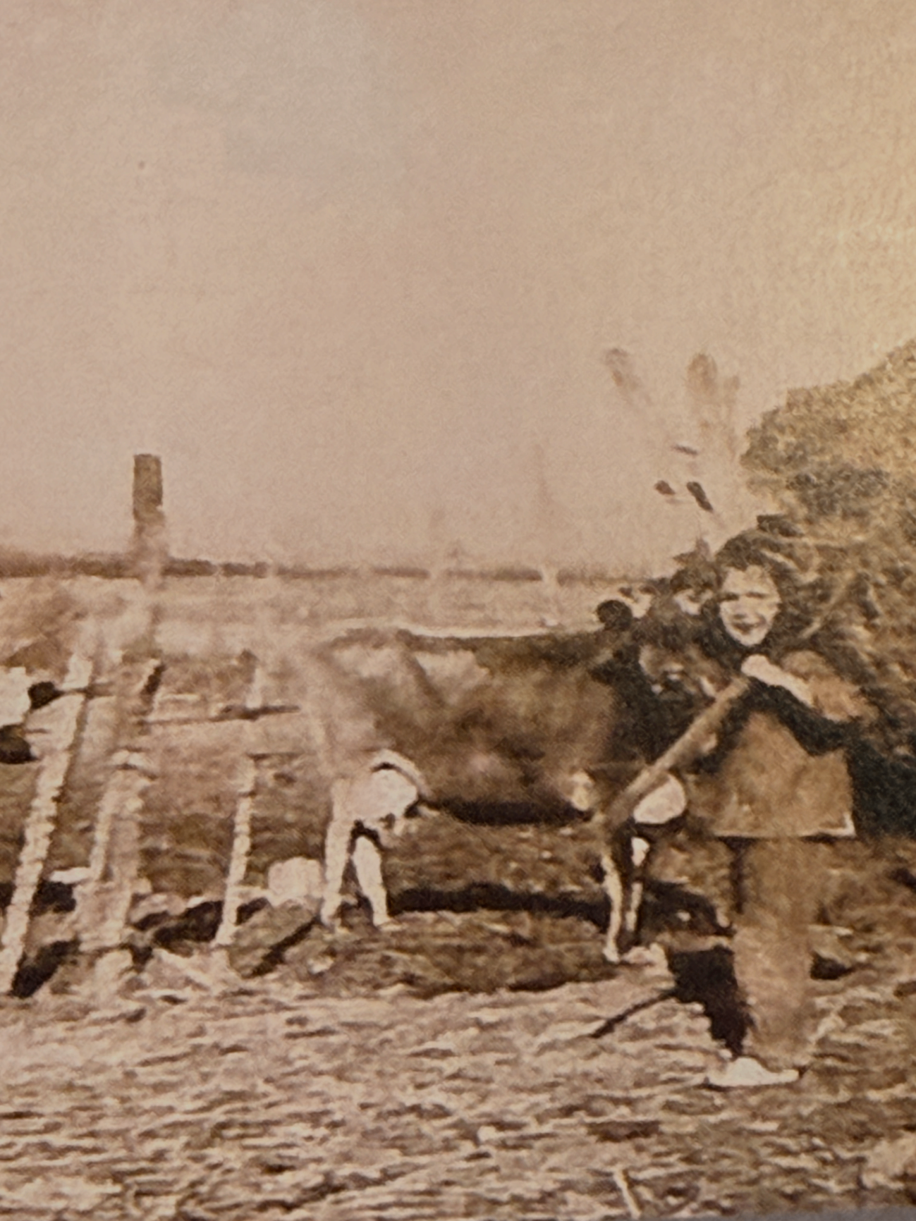 Daddy doing farm chores at a very young age